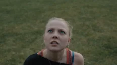 Scene from Balcony (2015) showing tension between characters exploring themes of identity and racial prejudice