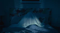 Scene from It Listens 2022 showing a smart speaker hiding dark secrets
