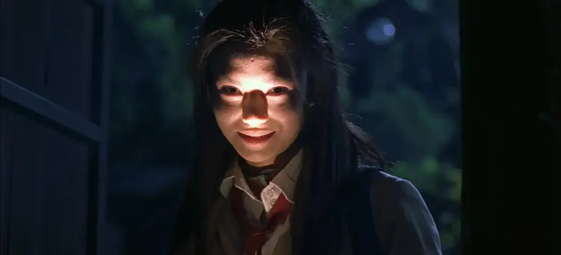 Battle Royale 2001 Japanese movie scene showing students in survival battle on the island