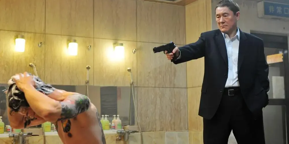Scene from Outrage: Way of the Yakuza 2011 showing Takeshi Kitano’s brutal yakuza world