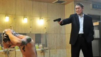 Scene from Outrage: Way of the Yakuza 2011 showing Takeshi Kitano’s brutal yakuza world