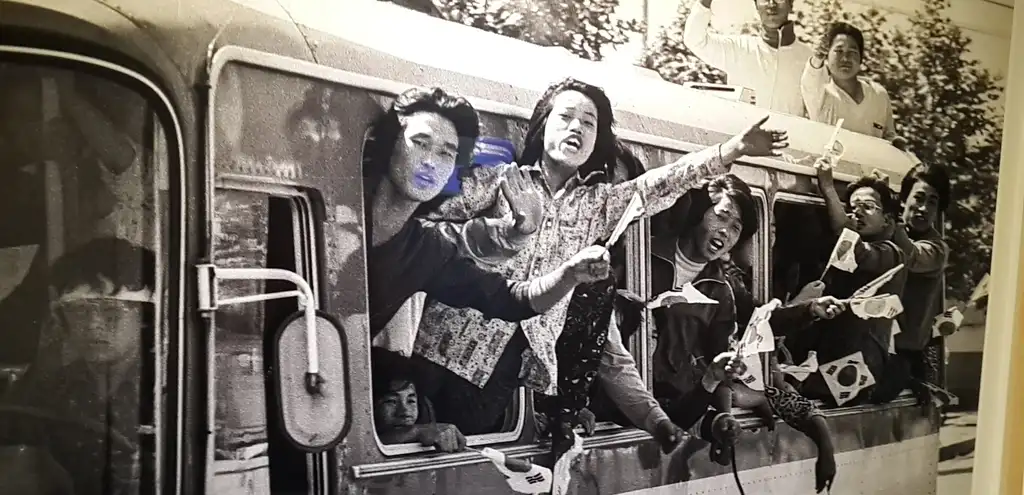 Scene from A Taxi Driver 2017 showing the taxi driver and journalist during the Gwangju Uprising