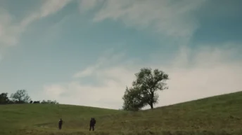 Crash Site sci-fi short film scene featuring Steven Yeun and Sam Richardson in a tense extraterrestrial crash setting